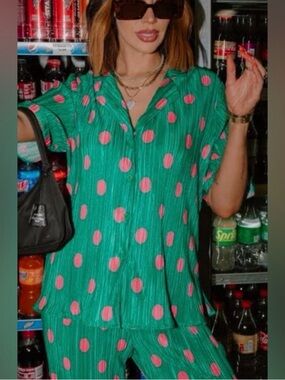 Dressed in LaLa green and pink polka dot set (L)